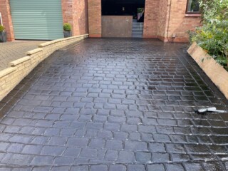 Cobble impressed concrete drive